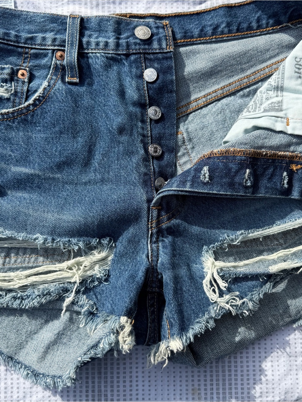 Women’s Distressed Blue Denim Shorts - Classic Button Fly